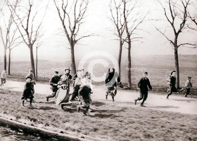 Children running alongside a canal, Monnickendam, Netherlands, 1898.Artist: James Batkin