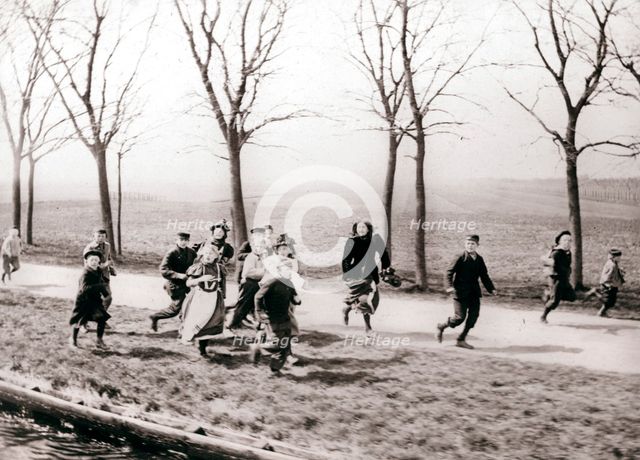 Children running alongside a canal, Monnickendam, Netherlands, 1898.Artist: James Batkin
