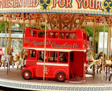Children's carousel at a funfair in Street, Somerset, c2000. Artist: M Hesketh-Roberts