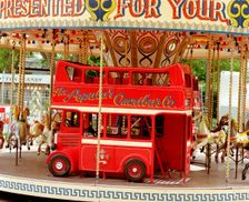 Children's carousel at a funfair in Street, Somerset, c2000. Artist: M Hesketh-Roberts