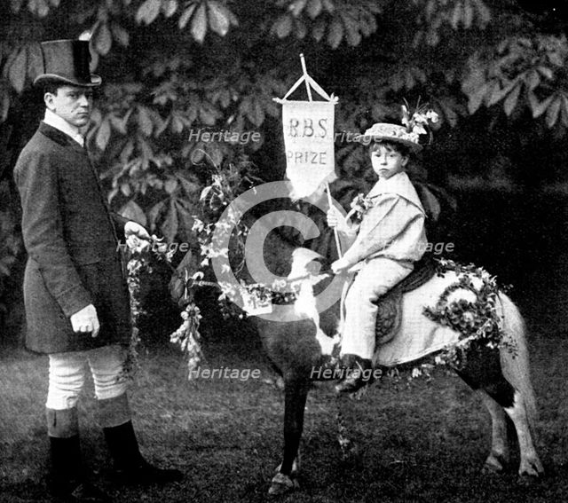 Children's Floral Fête, Royal Botanical Society's Gardens, Regent's Park: Sir Walter's pony, 1895. Creator: Russell & Sons.