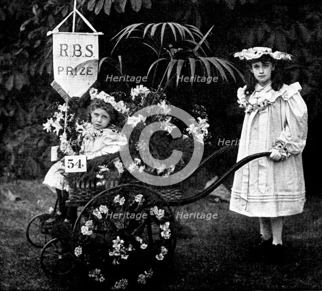 Children's Floral Fête, Royal Botanical Society's Gardens, Regent's Park: Mr. Garford's...cart, 1895 Creator: Russell & Sons.