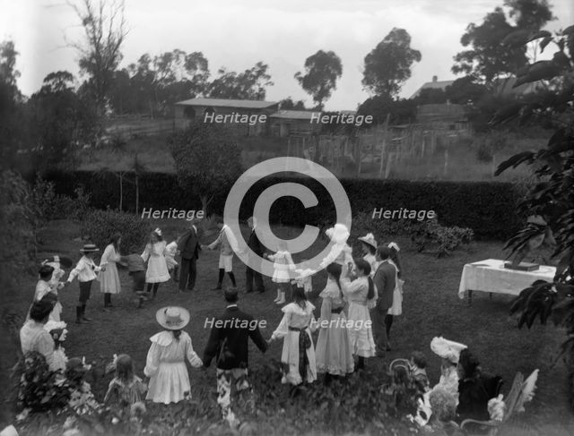 Children's party in the grounds of the Herston residence, Coralyn (Clyde Road), 1907. Creator: Robert Augustus Henry L'Estrange.