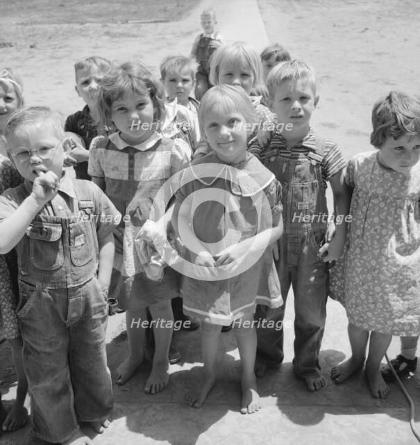 Children who attend nursery school, Farmersville FSA camp, Tulare County, California, 1939. Creator: Dorothea Lange.