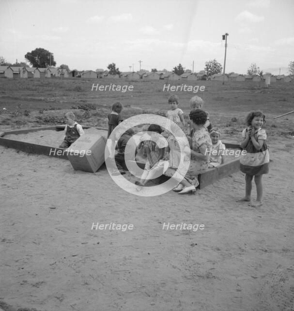 Children who attend nursery school, Farmersville FSA camp, Tulare County, California, 1939 Creator: Dorothea Lange.