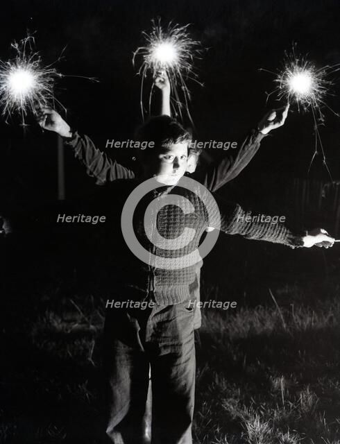 Children with fireworks, c1955. Creator: Arthur Charles Kirby Ware.