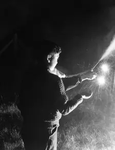 Children with fireworks, c1955. Creator: Arthur Charles Kirby Ware