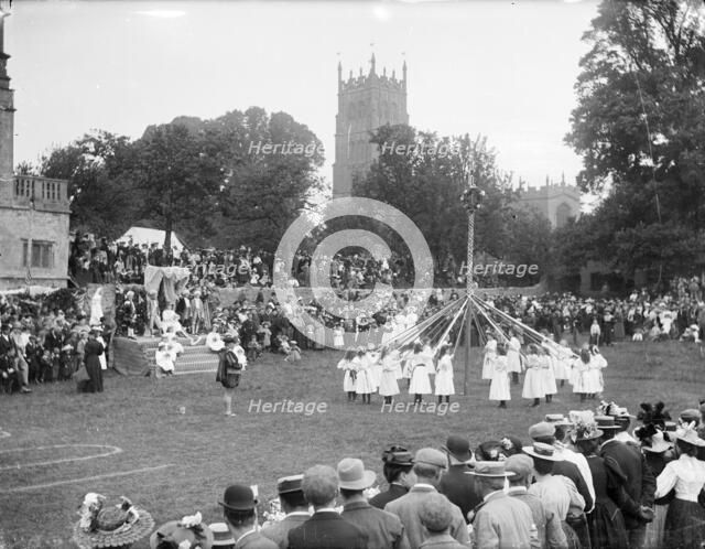 Children taking part in the village maypole dance at Chipping Campden, Gloucestershire. Artist: Henry Taunt
