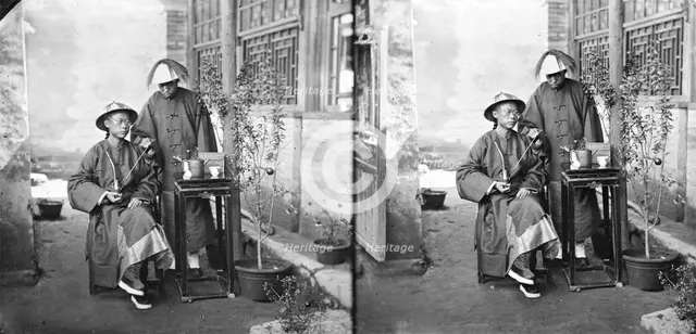 China: a Manchu man with a servant, Beijing, 1869. Creator: John Thomson.