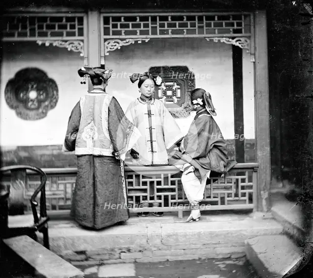 China: three Manchu ladies inside a courtyard, Beijing, 1869. Creator: John Thomson.