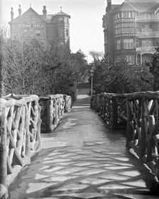 Chine Hall and White Lodge Hotel from the Rustic Bridge, Boscombe Chine and Gardens..., 1900. Creator: Robert Augustus Henry L'Estrange