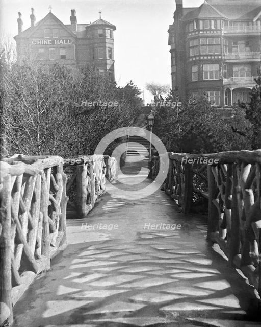 Chine Hall and White Lodge Hotel from the Rustic Bridge, Boscombe Chine and Gardens..., 1900. Creator: Robert Augustus Henry L'Estrange.