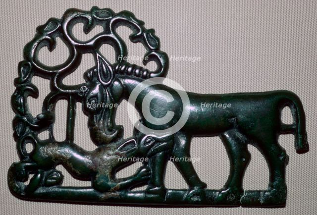 Chinese third century BC bronze plaque, depicting an animal attacking a horse. Artist: Unknown