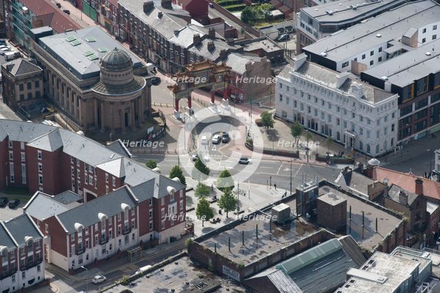 Chinese Arch, gateway to Chinatown, and former Congregational Church, Liverpool, 2015. Creator: Historic England.