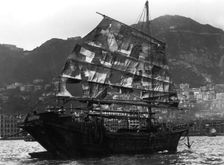 Chinese boat in a harbour, 20th century