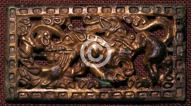 Chinese bronze belt-buckle with animals in combat, 5th century BC. Artist: Unknown
