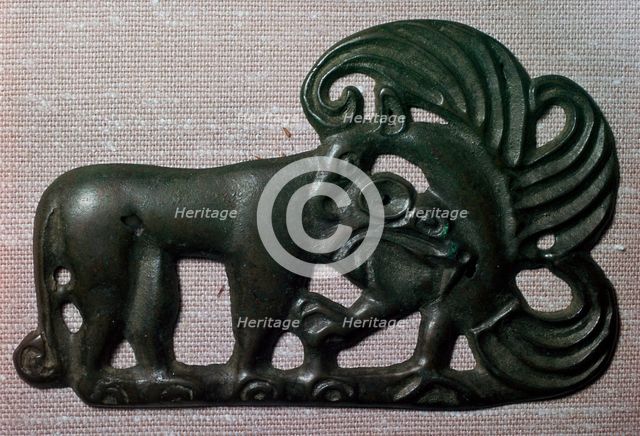 Chinese bronze harness plaque of a tiger and gryphon, 2nd century BC. Artist: Unknown