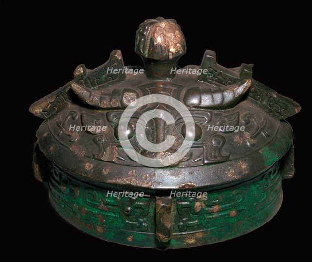 Chinese bronze lid of a wine-vessel, 11th century BC.h Artist: Unknown