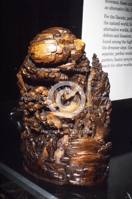 Chinese carving, Mountain with Daoist Immortals examing Ying Yang Diagram,  18th century Artist: Unknown.