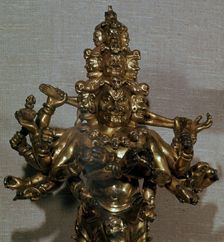 Chinese gilt-bronze statuette of a Dharmapala, 13th century