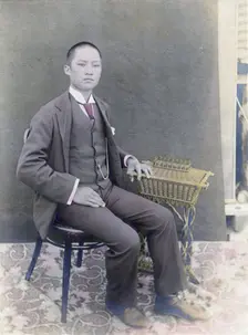 Chinese man who owned an orange orchard in Newcastle California, 1902. Creator: Robert Augustus Henry L'Estrange