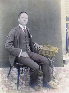 Chinese man who owned an orange orchard in Newcastle California, 1902. Creator: Robert Augustus Henry L'Estrange