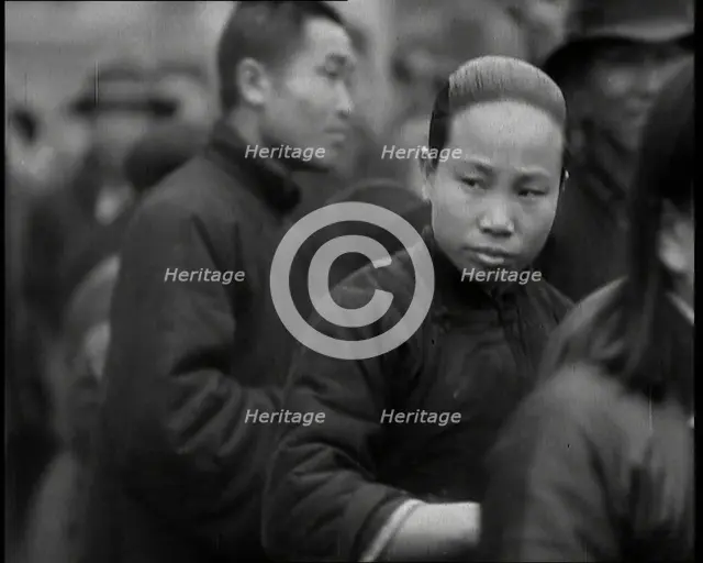 Chinese Men and Women Seeking Refugee from the Japanese Attack On Shangha..., 1937. Creator: British Pathe Ltd.