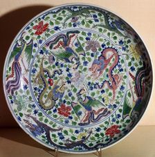 Chinese porcelain dish with a design of dragons and phoenixes, 17th century BC