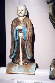 Chinese Pottery Ridge Tile figure of Buddhas disciple, Ming Dynasty. 16-17th century