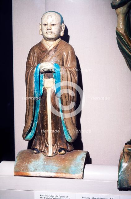 Chinese Pottery Ridge Tile figure of Buddhas disciple, Ming Dynasty. 16-17th century. Artist: Unknown.