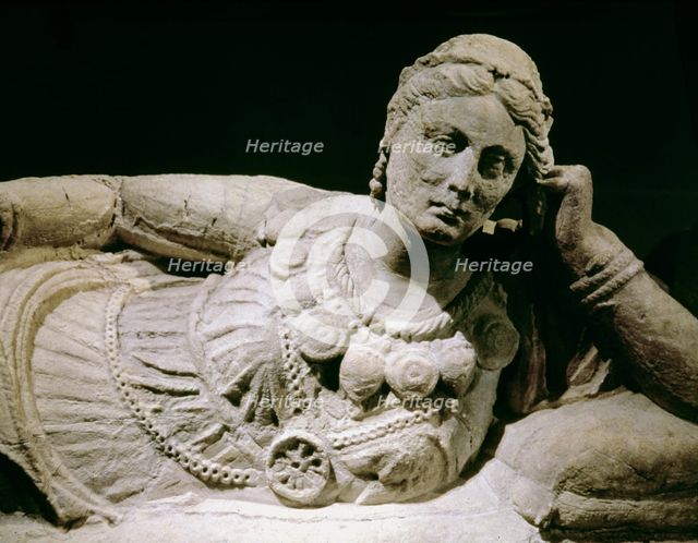 Chiusi sarcophagus made in alabaster, with the reclining figure of the deceased woman with a fan.…