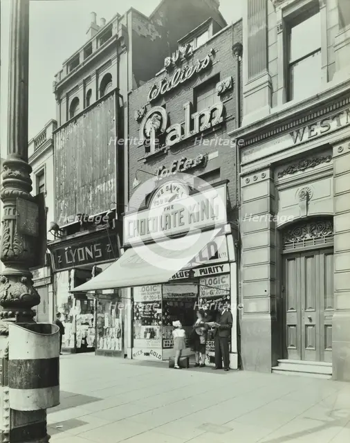 'Chocolate King' sweetshop, Upper Street, Islington, London, 1944. Artist: Unknown.
