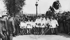 Choirboys of St Clement Danes beating the boundary-marks with long wands, London, 1926-1927