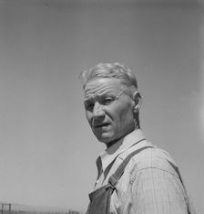 Chris Ament, German-Russian dry land wheat farmer..., south of Quincy, Washington, 1939. Creator: Dorothea Lange