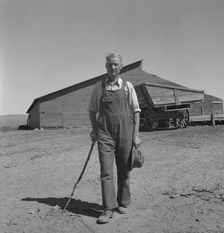 Chris Ament, on dry land wheat farm of Columbia Basin where..., south of Quincy, Washington, 1939. Creator: Dorothea Lange