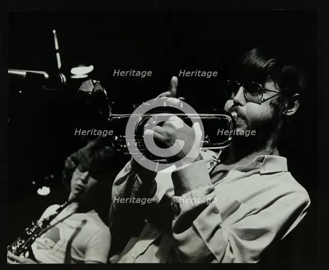 Chris Hunter (saxophone) and Guy Barker (trumpet) playing at The Stables, Wavendon, Buckinghamshire. Creator: Denis Williams.