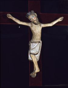 Christ of Solsona polychromed wood carving, Christ crucified with feet together by a single n…