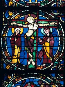 Christ on the Cross, stained glass, Chartres Cathedral, France, 1194-1260.