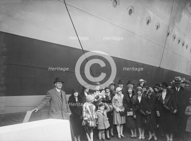 Christening Group possibly at J Samuel White and Co shipyard, Cowes, Isle of Wight, c1930s.  Creator: Kirk & Sons of Cowes.