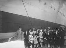 Christening Group possibly at J Samuel White and Co shipyard, Cowes, Isle of Wight, c1930s. Creator: Kirk & Sons of Cowes