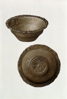 Christian monogram on base of pewter bowl from London. Creator: Unknown