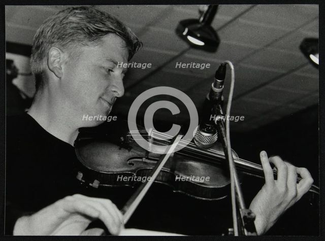 Christian Garrick playing the violin at The Fairway, Welwyn Garden City, Hertfordshire, 2000. Artist: Denis Williams