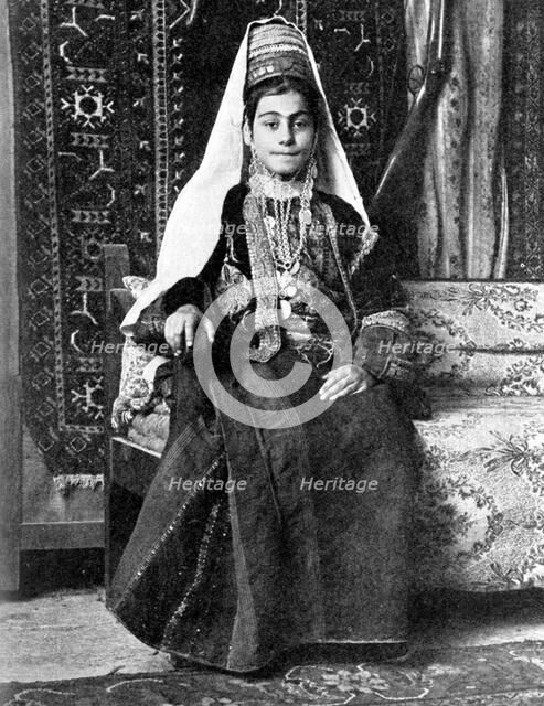 Christian woman in a wedding dress, Palestine, 1936.Artist: Donald McLeish