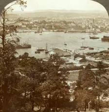 Christiania and her busy harbor, N.W. from the Ekeberg (Royal Palace at right), Norway c1905. Creator: Unknown