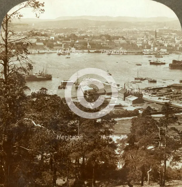 'Christiania and her busy harbor, N.W. from the Ekeberg (Royal Palace at right), Norway', c1905. Creator: Unknown.