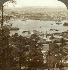 Christiania and her busy harbor, N.W. from the Ekeberg (Royal Palace at right), Norway c1905. Creator: Unknown