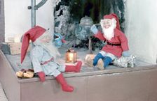 Christmas brownies on a mantelpiece, 1960s. Creator: Göran Algård