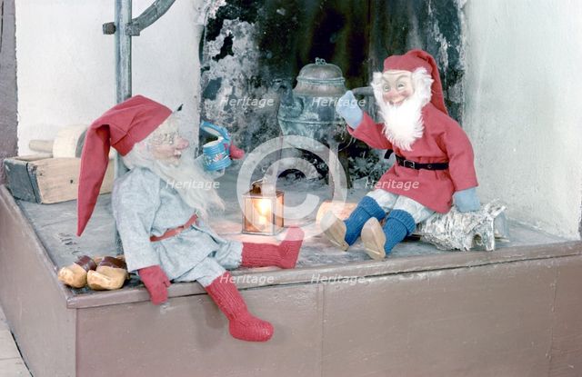 Christmas brownies on a mantelpiece, 1960s. Creator: Göran Algård.