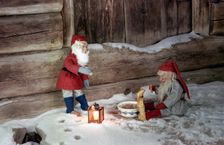 Christmas brownies getting their christmas porridge, 1960s. Creator: Göran Algård