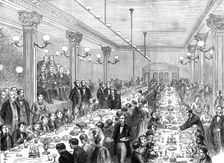 Christmas dinner given to the newsboys of Manchester, 1874. Creator: Unknown
